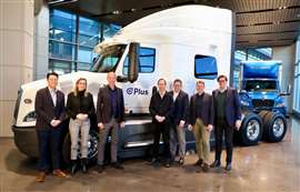 Executives from Traton and Plus with International LT Series from Navistar fitted with Plus system
